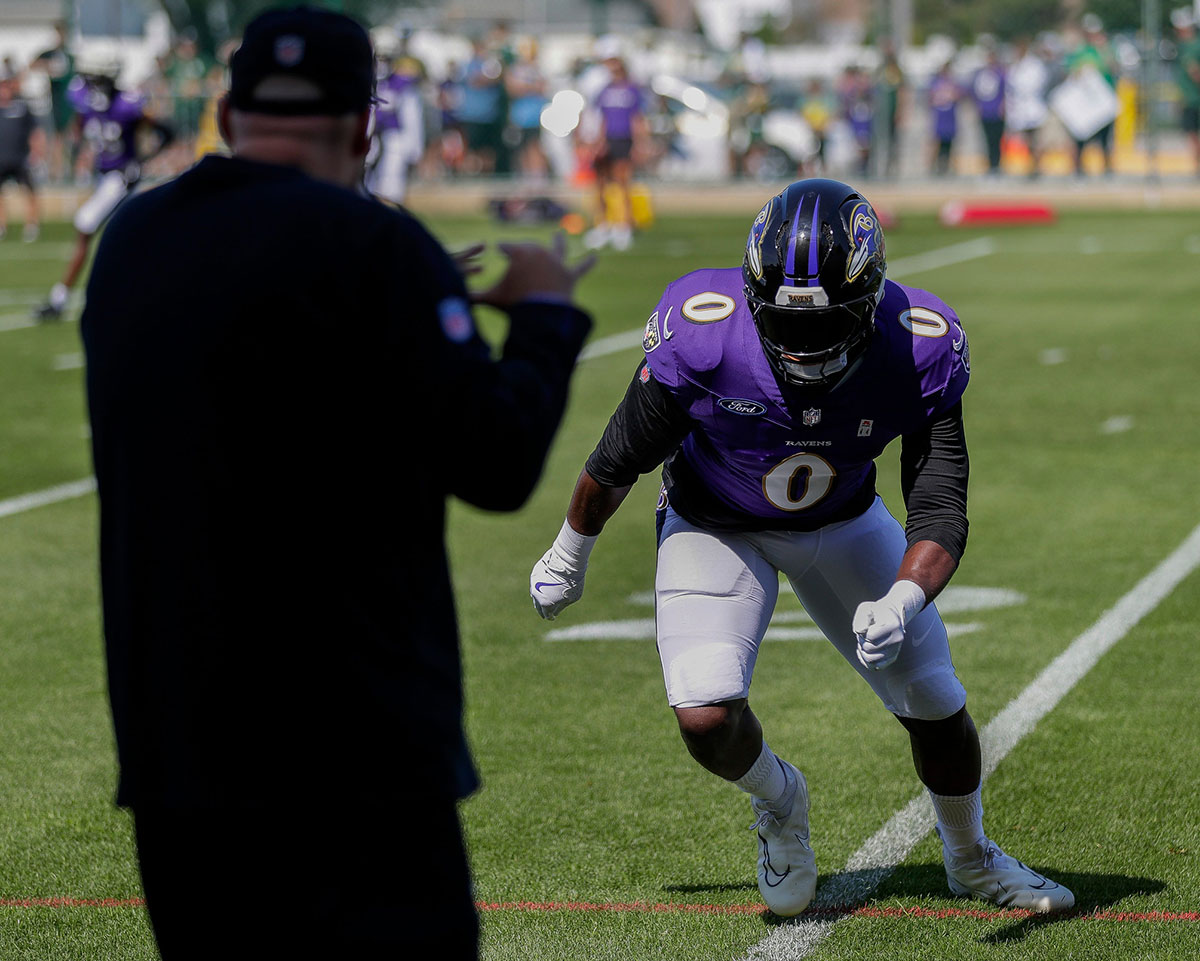 Ravens linebacker Roquan Smith (0) runs through a drill during a joint practice with the Green Bay Packers on Thursday, August 22, 2024, at Ray Nitschke Field in Ashwaubenon, Wis. 