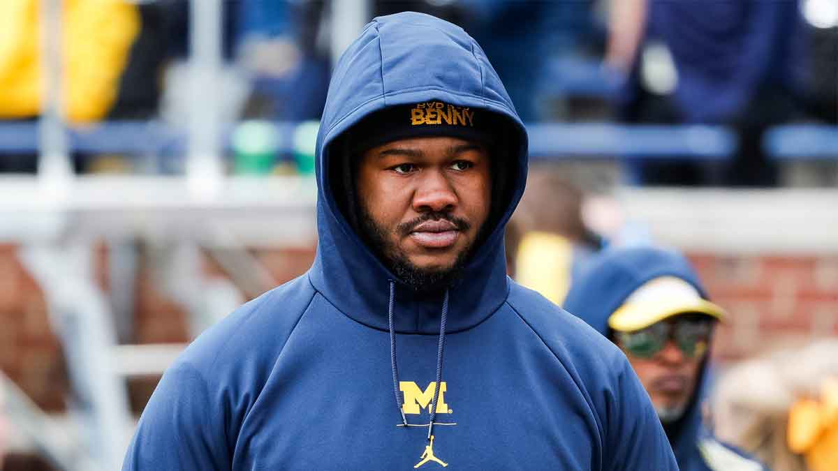 Michigan defensive lineman Rayshaun Benny (26) watches warmup during the spring game at Michigan Stadium