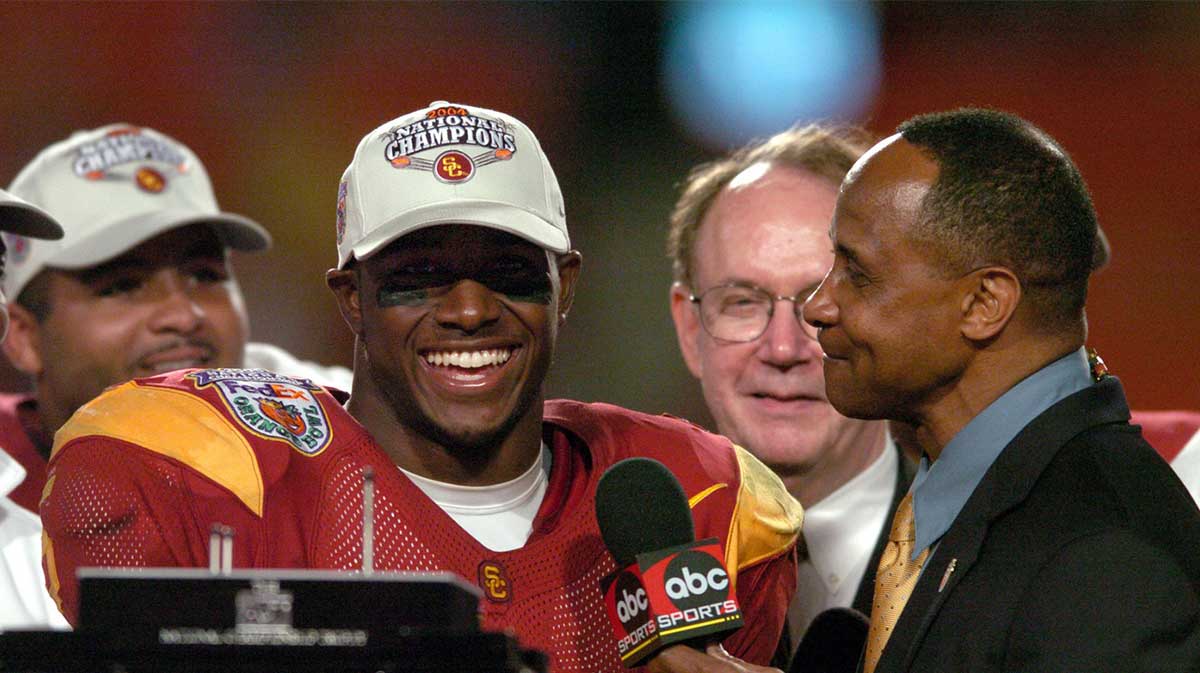 Southern California Trojans running back Reggie Bush is interviewed by ABC broadcaster Lynn Swann after 55-19 victory over Oklahoma in the FedEx Orange Bowl in the BCS National Championship.