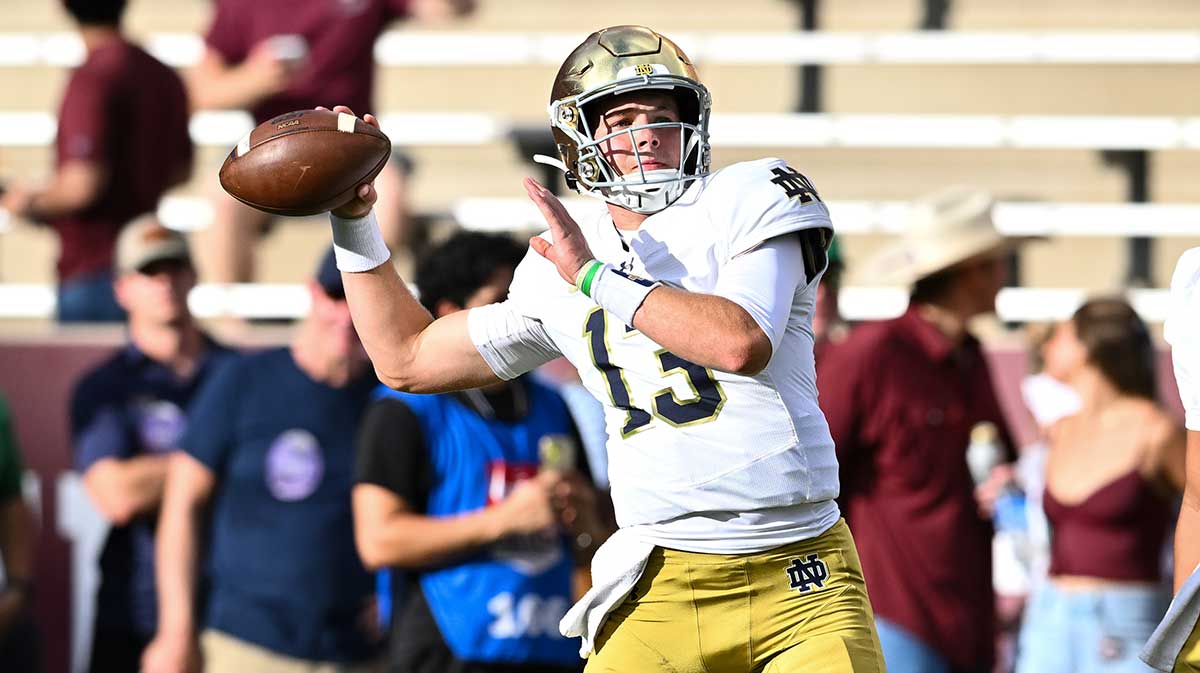 Notre Dame Fighting Irish quarterback Riley Leonard (13) warms up prior to the game against the Texas A&M Aggies at Kyle Field.