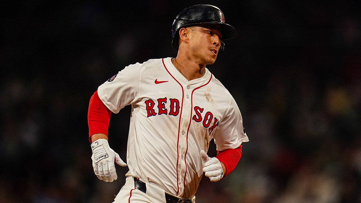 Boston Red Sox right fielder Rob Refsnyder (30) hits a home run against the Baltimore Orioles in the eighth inning at Fenway Park.