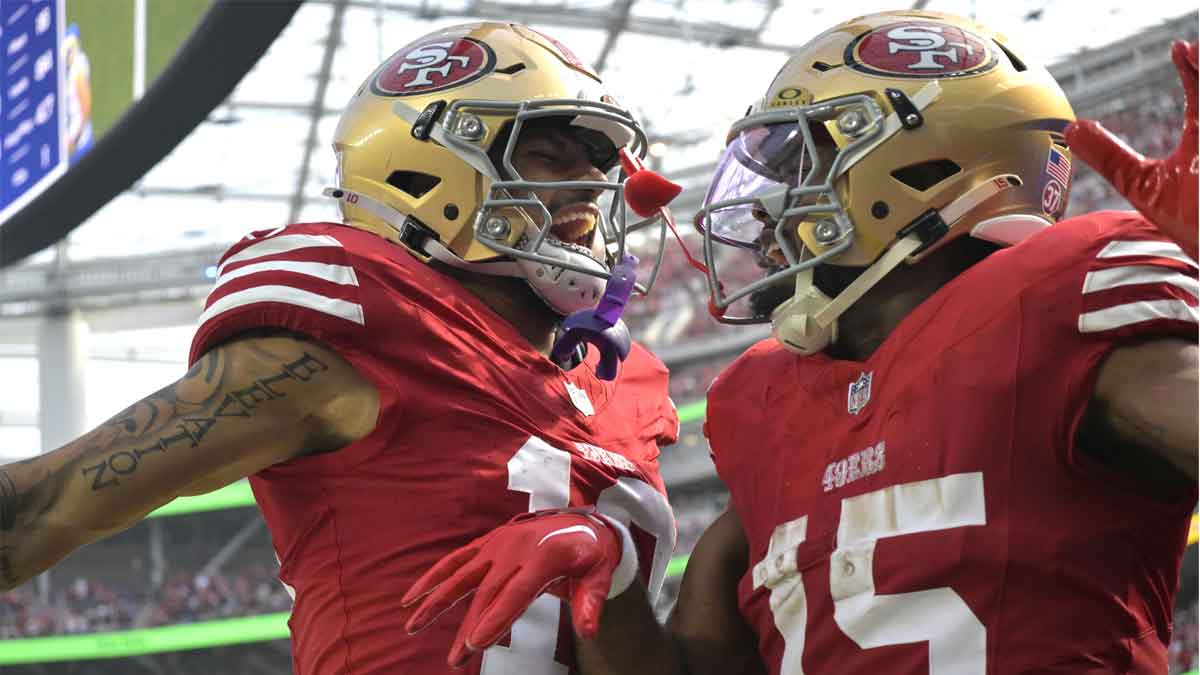 San Francisco 49ers wide receiver Jauan Jennings (15) celebrates with wide receiver Ronnie Bell (10) after scoring a touchdown in the second half against the Los Angeles Rams at SoFi Stadium.