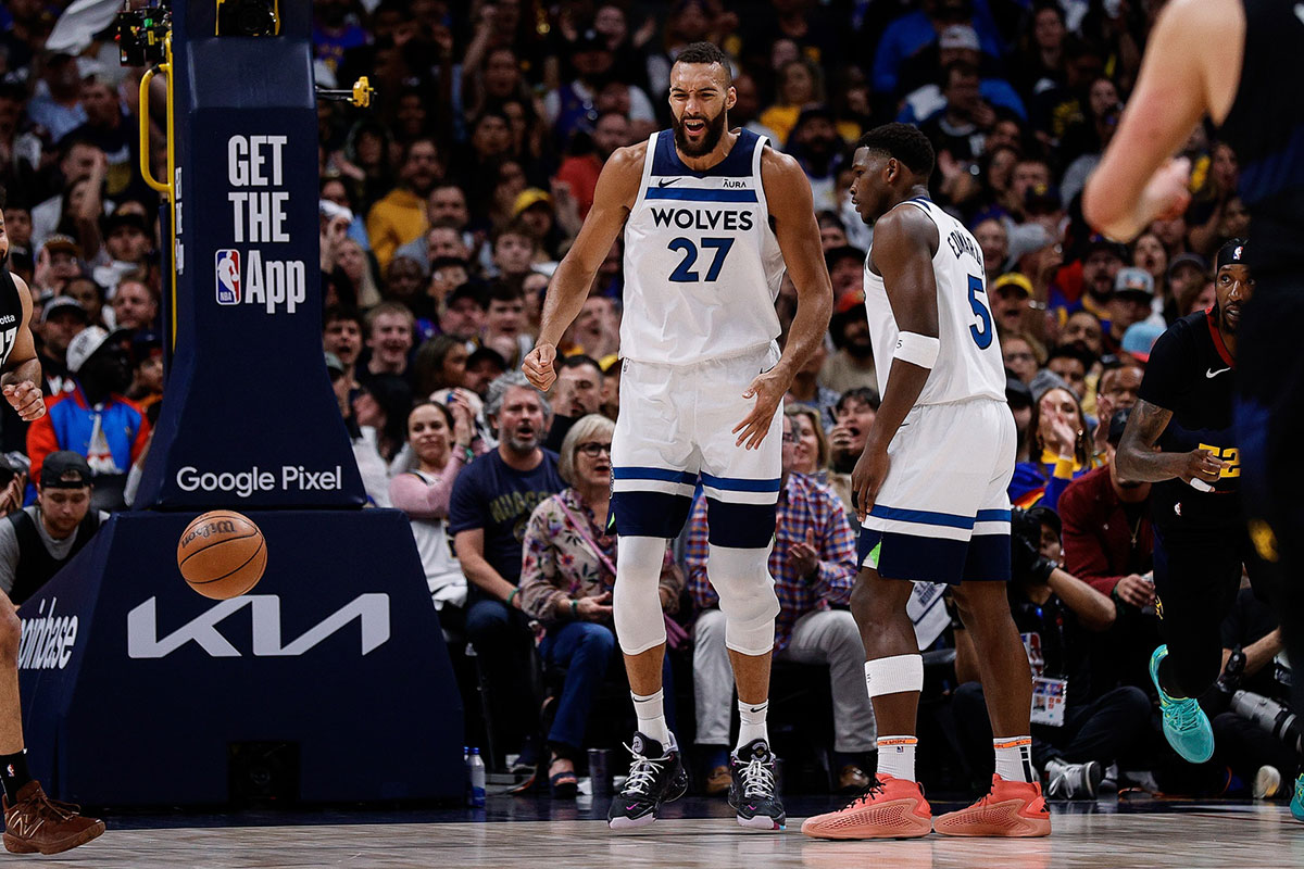 Minnesota Timbervolves Center Rudi Gobert (27) reacts in front of the Anthony Edwards (5) after the play in the first quarter of Denver in the game five from the second round to 2024. NBA in the Ball Arena. NBA in the Ball Arena.