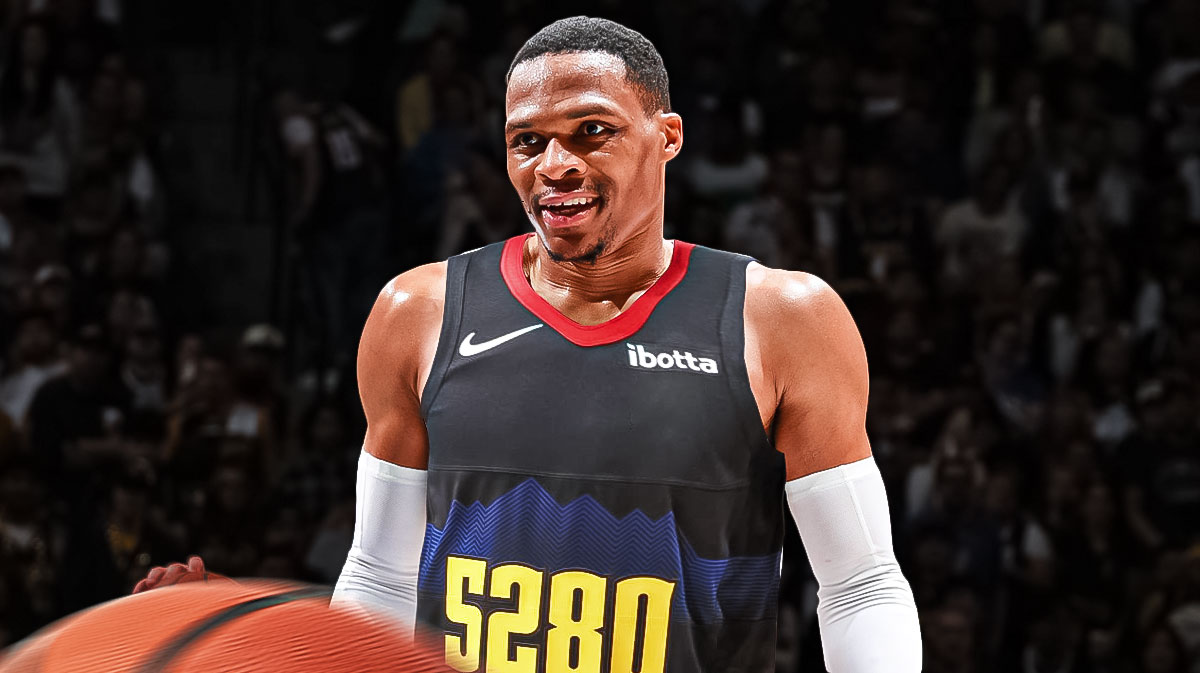Nuggets guard Russell Westbrook, Ball Arena behind him