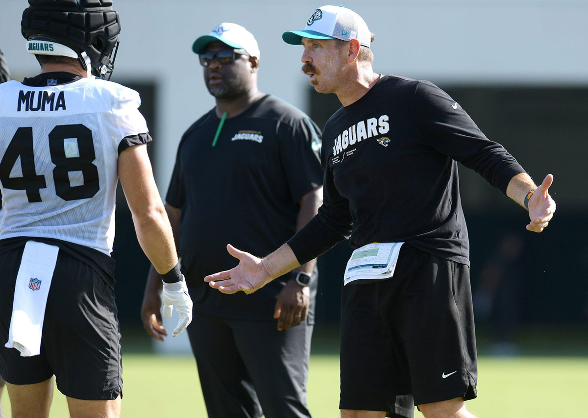 Jaguars defensive coordinator Ryan Nielsen talks with his players during the fourth day of the NFL football training camp practice session Saturday, July 27, 2024 at EverBank Stadium's Miller Electric Center in Jacksonville, Fla.