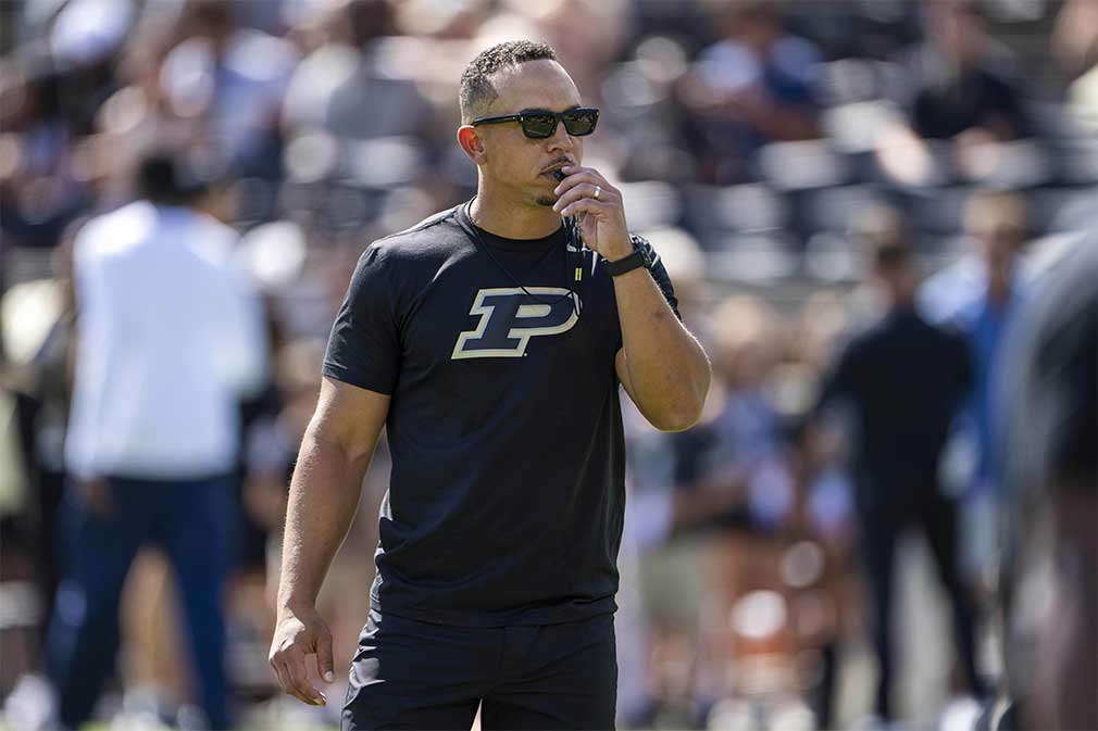 Purdue Boilermakers head coach Ryan Walters walks on the field during warm ups before a game against the Notre Dame Fighting Irish at Ross-Ade Stadium.