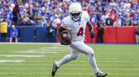 Arizona Cardinals wide receiver Greg Dortch (4) runs with the ball against the Buffalo Bills during the second half at Highmark Stadium.
