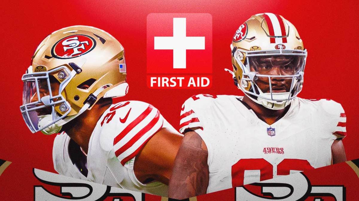 Jordan Elliott in a San Francisco 49ers uniform and Curtis Robinson in a San Francisco 49ers uniform with a red and white first aid symbol as both players are out with injuries as the 49ers deal with injuries and fell to 1-2.