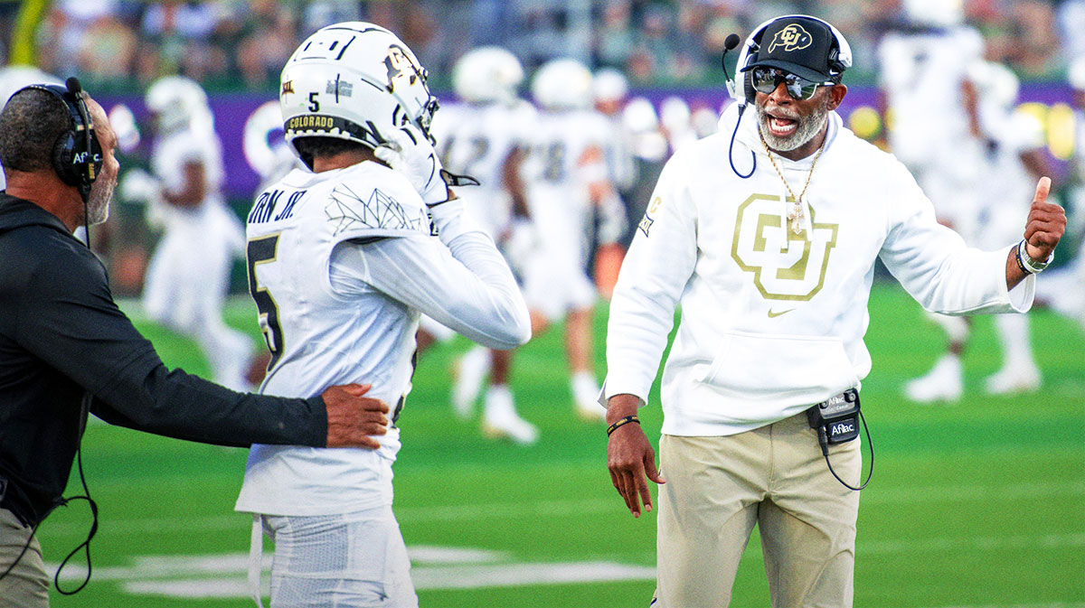 CU football head coach Deion Sanders, or Coach Prime, gives instruction to wide receiver Jimmy Horn Jr. (5) against CSU in the Rocky Mountain Showdown at Canvas Stadium on Saturday, Sept. 14, 2024, in Fort Collins, Colo.