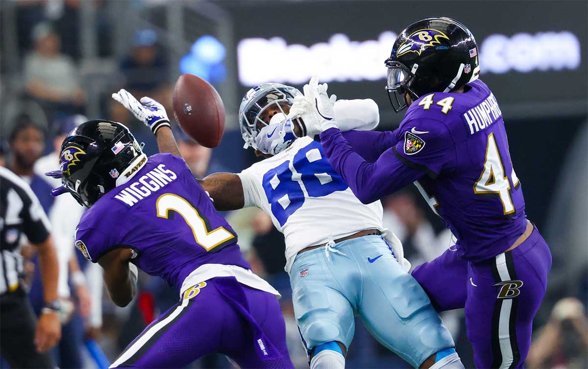 Baltimore Ravens cornerback Nate Wiggins (2) and Baltimore Ravens cornerback Marlon Humphrey (44) defend a pass intended for Dallas Cowboys wide receiver CeeDee Lamb (88) during the second half at AT&T Stadium.