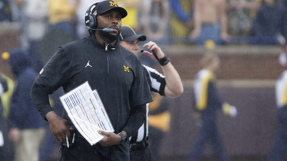 Michigan Wolverines head coach Sherrone Moore on the sideline in the first half against the Minnesota Golden Gophers at Michigan Stadium.