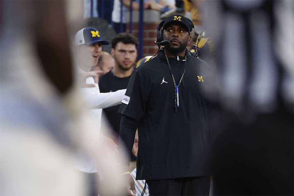 Michigan Wolverines head coach Sherrone Moore on the sideline in the first half against the Fresno State Bulldogs at Michigan Stadium.