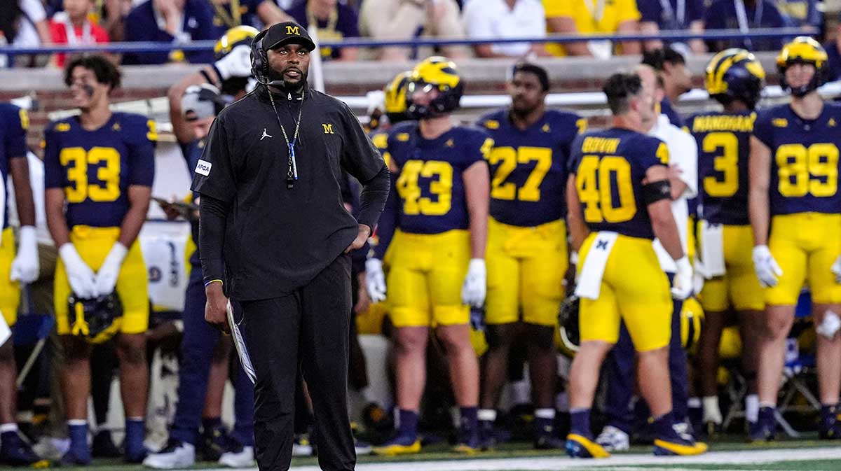 Michigan head coach Sherrone Moore looks up during the first half against Fresno State at Michigan Stadium at Michigan Stadium