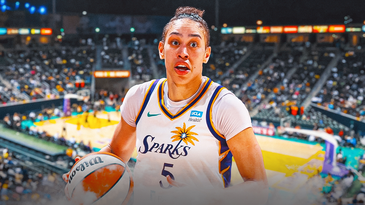 LA Sparks player Dearica Hamby with the LA Sparks arena in the background, WNBA season