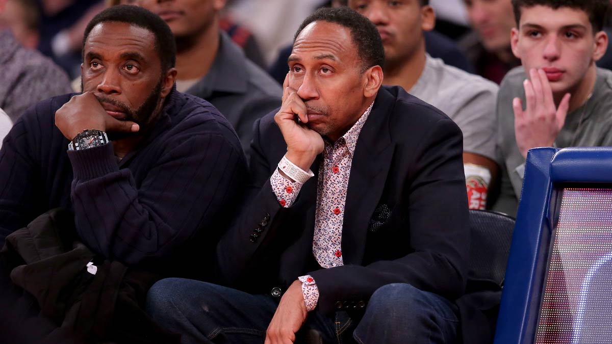 Sports broadcaster Stephen A. Smith sits court side during the third quarter between the New York Knicks and the Miami Heat at Madison Square Garden.