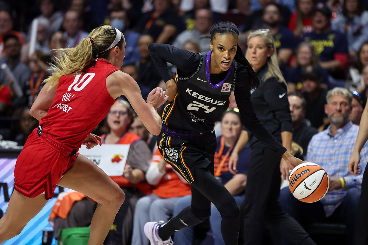 Connecticut Sun guard DeWanna Bonner (24) drives to the basket defended by Indiana Fever guard Lexie Hull (10) during the second half during game two of the first round of the 2024 WNBA Playoffs at Mohegan Sun Arena.