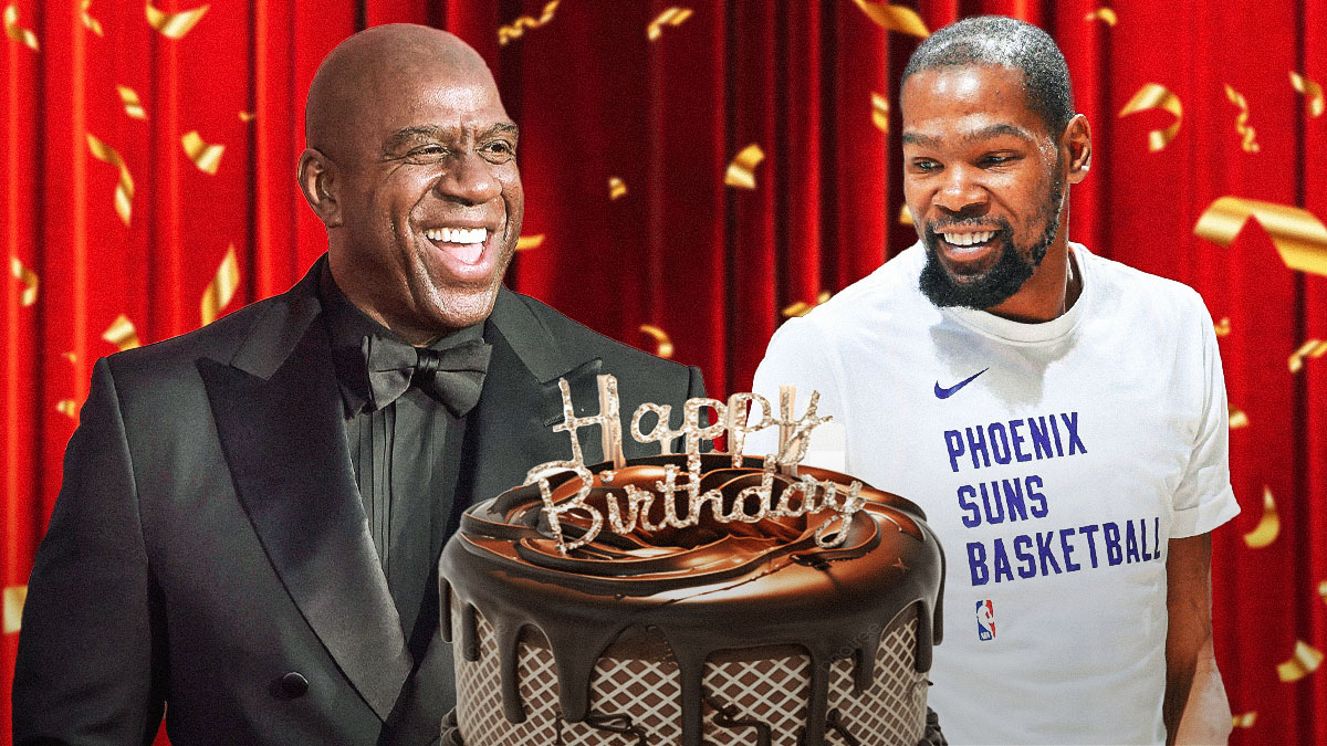Magic Johnson and Kevin Durant with a birthday cake between them