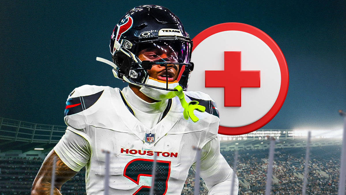 Tank Dell in Texans uniform with Red Cross medical symbol next to him