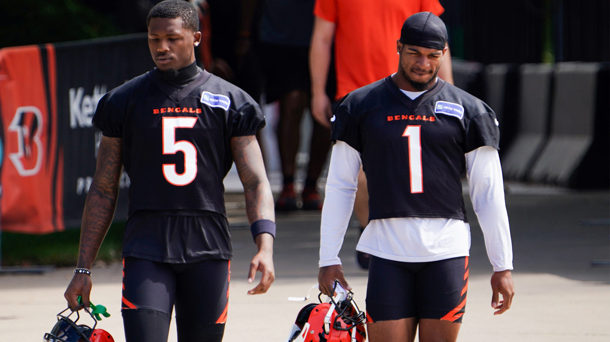 Cincinnati Bengals wide receiver Tee Higgins (5) and Cincinnati Bengals wide receiver Ja'Marr Chase (1) walk to the practice field, Wednesday, Sept. 4, 2024, in Cincinnati.