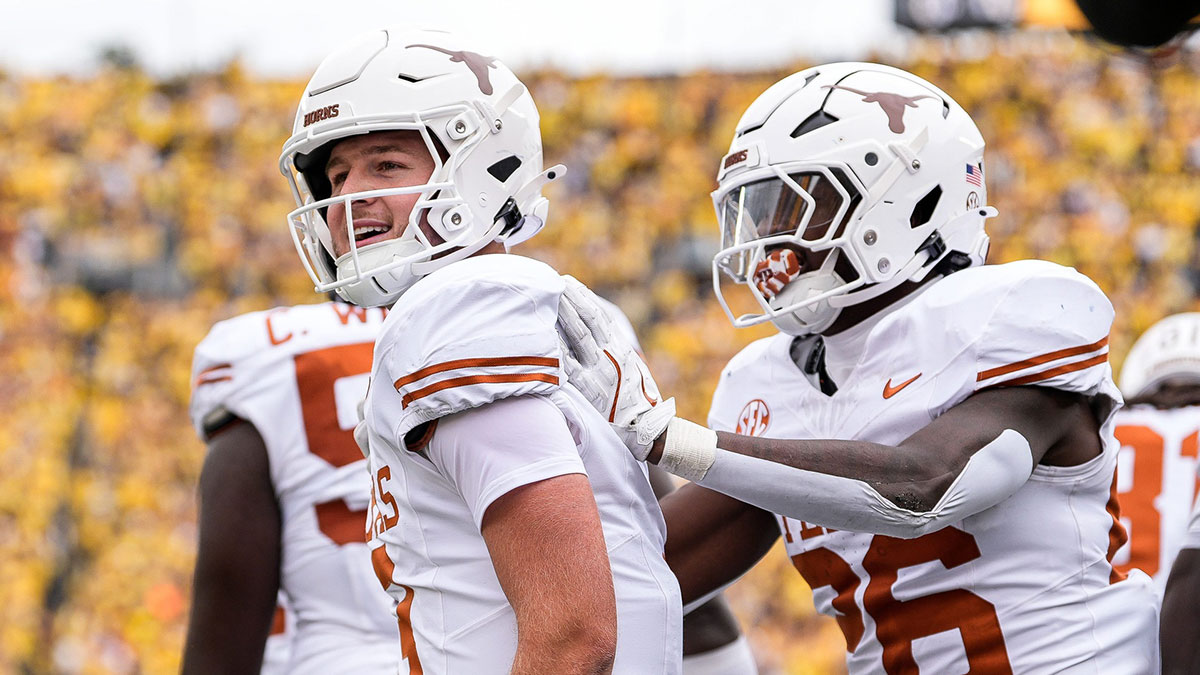 Texas quarterback Quinn Ewers (3) celebrates a touchdown against Michigan during the first half at Michigan Stadium in Ann Arbor on Saturday, September 7, 2024.
