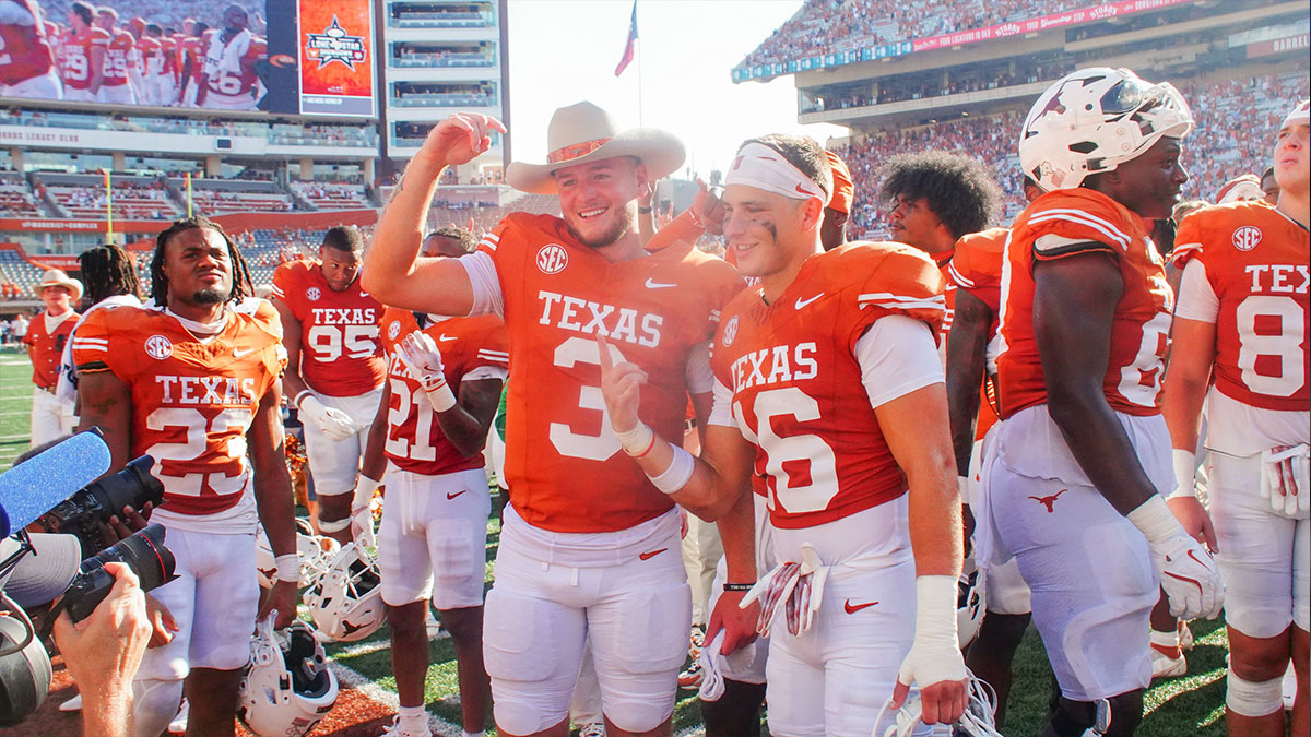 Texas Longhorns quarterback Quinn Ewers (3) and defensive back Michael Taaffe (16) pose for a picture after defeating the Colorado State Rams at Darrell K Royal-Texas Memorial Stadium.