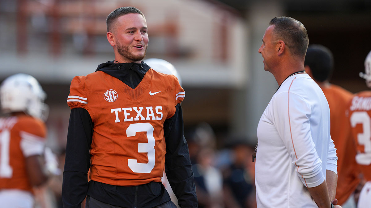 Texas Longhorns quarterback Quinn Ewers (3) talks with head coach Steve Sarkisian before the game against Louisiana Monroe Warhawks at Darrell K Royal-Texas Memorial Stadium.
