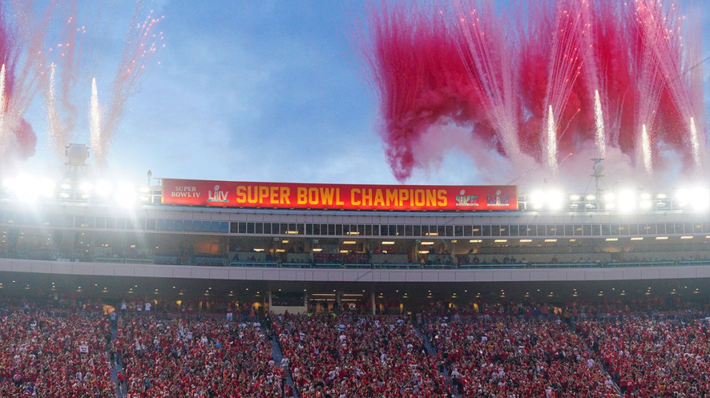 A new Super bowl banner is unfurled before the game between the Kansas City Chiefs and Baltimore Ravens at GEHA Field at Arrowhead Stadium.