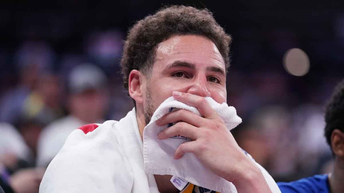 Former State Warriors guard Klay Thompson (11) sits on the bench during action against the Sacramento Kings in the fourth quarter during a 2024 NBA Playoffs playoff game at Golden 1 Center.