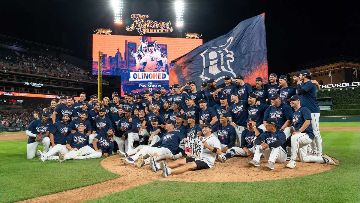 Players of the Detroit Tigers celebrate alongside family and friends after clinching a playoff after deafetaing the Chicago White Sox at Comerica Park in Detroit on Friday, Sept. 27, 2024.