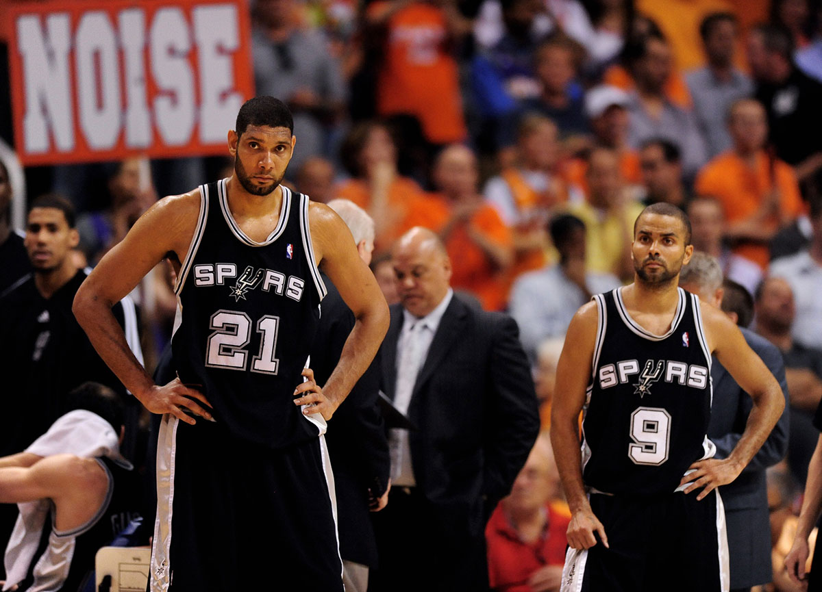 San Antonio Spurs forward (21) Tim Duncan and guard (9) Tony Parker react in the closing minutes of the game against the Phoenix Suns in game two in the western conference semifinals of the 2010 NBA playoffs at the US Airways Center. The Suns defeated the Spurs 110-102.