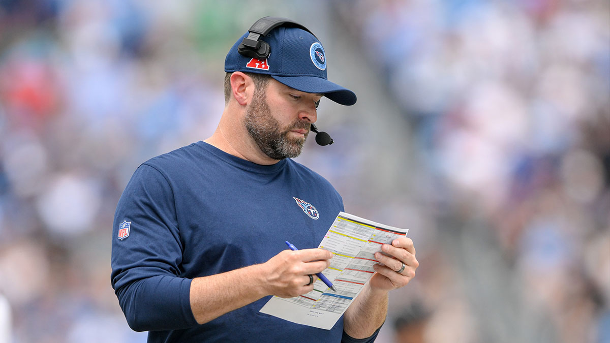 Titans head coach Brian Callahan looks at his play sheet against the New York Jets during the first half at Nissan Stadium