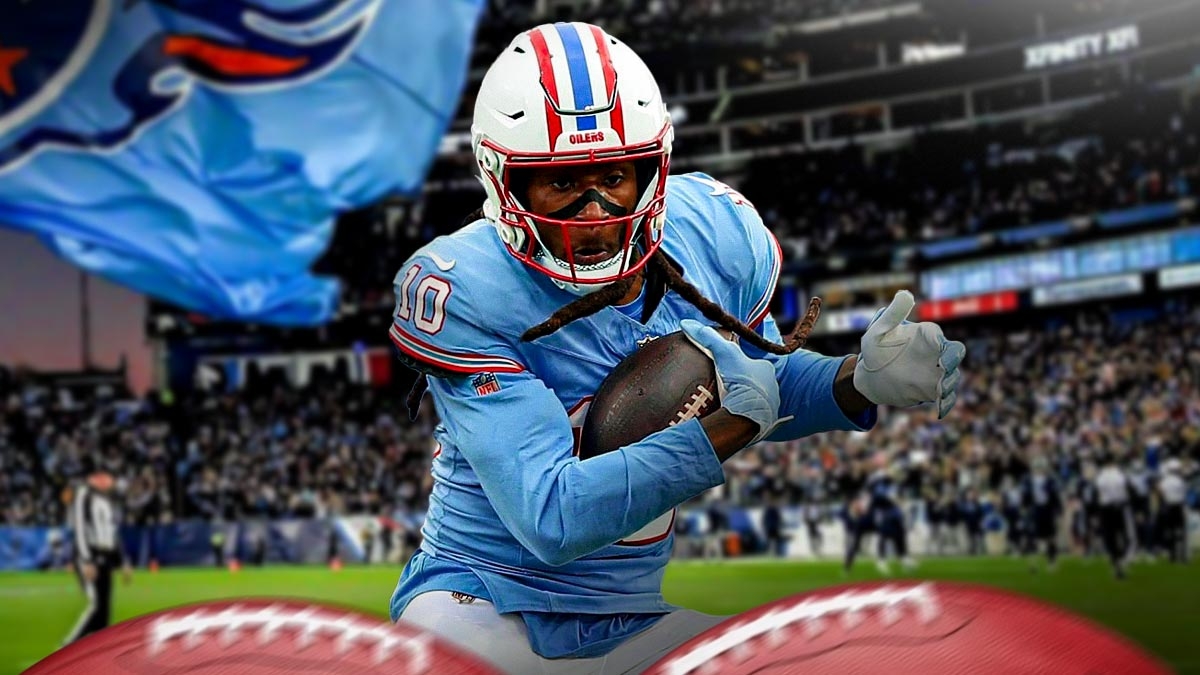 Titans' DeAndre Hopkins running with Bears players and injury reporters in background