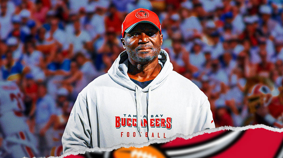 Todd Bowles with Buccaneers fans in background.