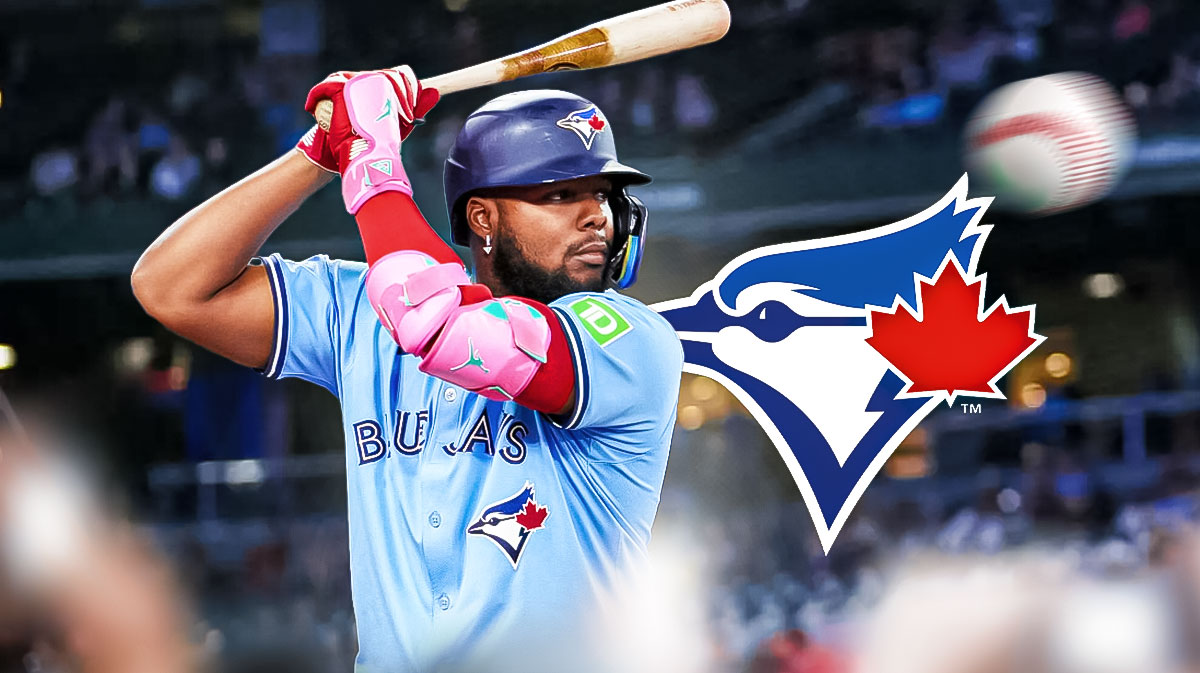 Blue Jays' Vladimir Guerrero Jr swinging and missing at the ball next to a Blue Jays logo
