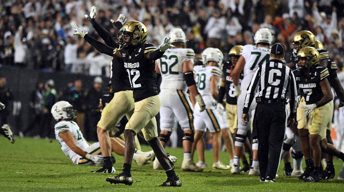Colorado Buffaloes wide receiver Travis Hunter (12) celebrates with teammates after a missed field goal by the Baylor Bears during the second half at Folsom Field.