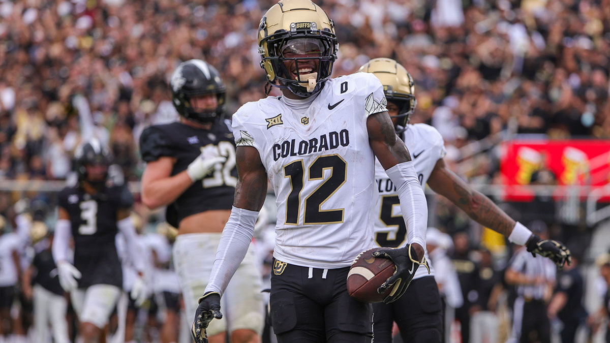Colorado Buffaloes wide receiver Travis Hunter (12) scores a touchdown against the UCF Knights during the first quarter at FBC Mortgage Stadium.