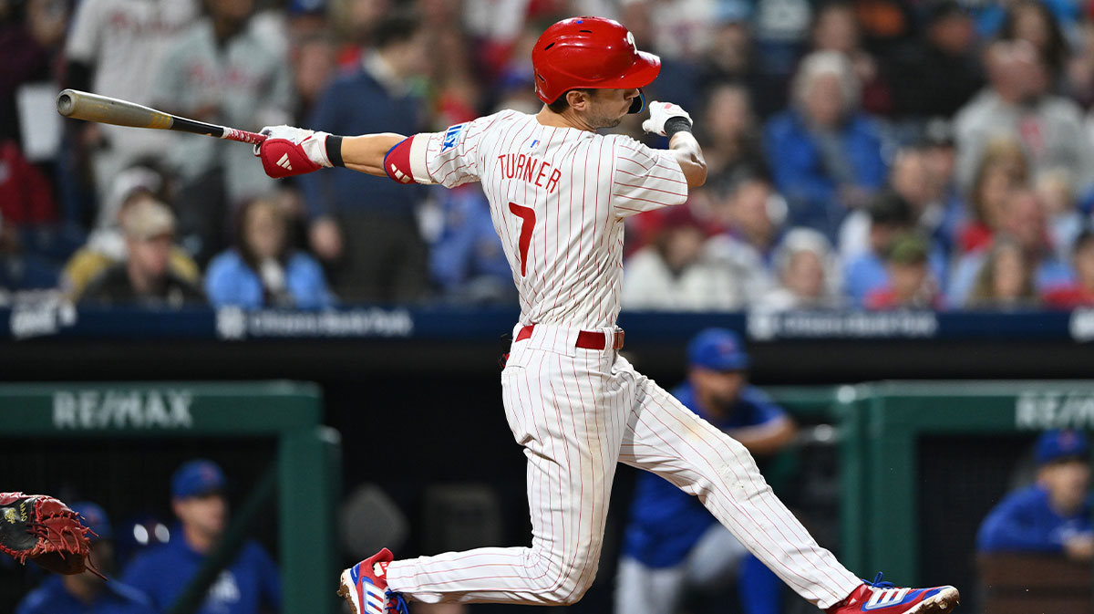 Sep 25, 2024; Philadelphia, Pennsylvania, USA; Philadelphia Phillies shortstop Trea Turner (7) hits a double against the Chicago Cubs in the eighth inning at Citizens Bank Park. 