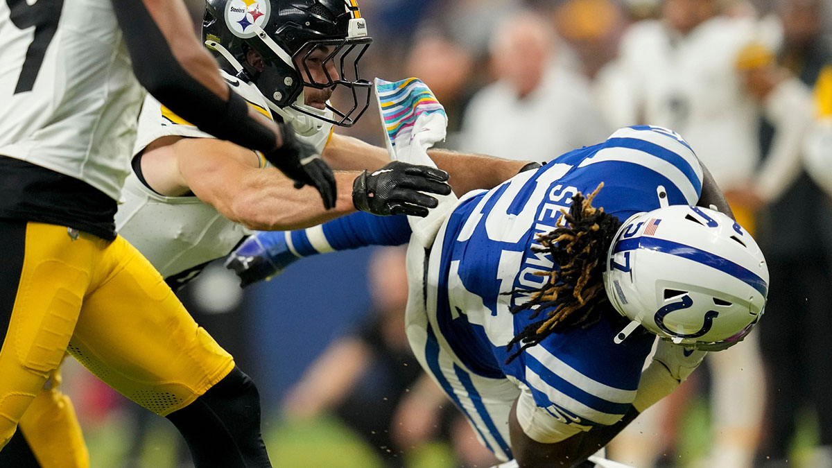 Pittsburgh Steelers linebacker Payton Wilson (41) tackles Indianapolis Colts running back Trey Sermon (27) on Sunday, Sept. 29, 2024, during a game against the Pittsburgh Steelers at Lucas Oil Stadium in Indianapolis.