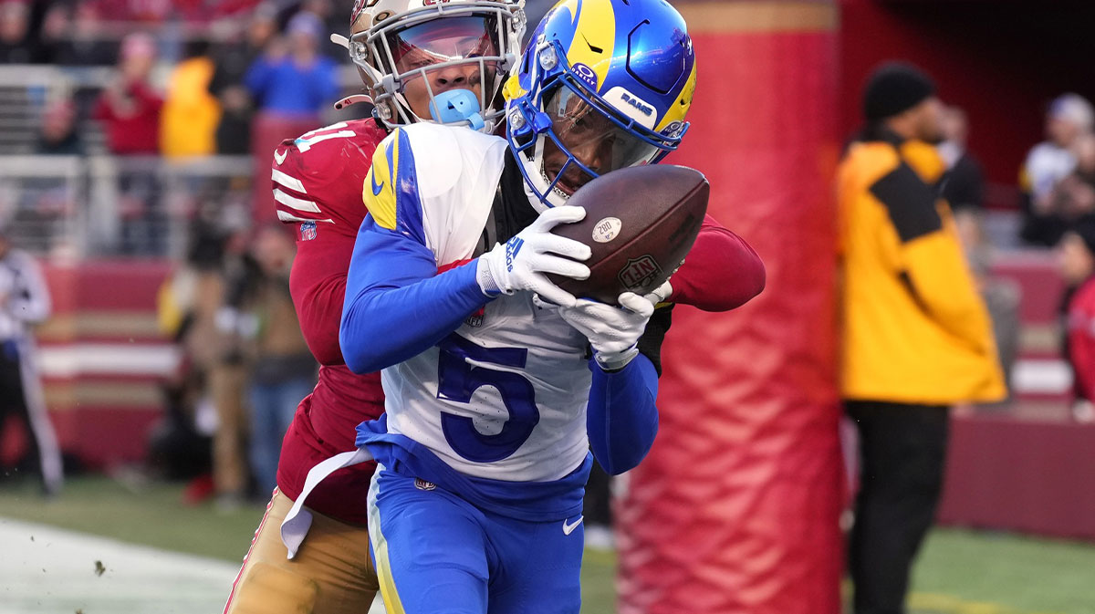 Los Angeles Rams wide receiver Tutu Atwell (5) catches a pass for a two-point conversion against San Francisco 49ers safety Tayler Hawkins (back) during the fourth quarter at Levi's Stadium.