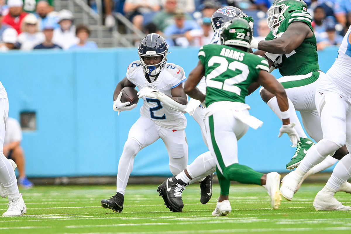 Tennessee Titans running back Tyjae Spears (2) runs the ball against the New York Jets during the first half at Nissan Stadium