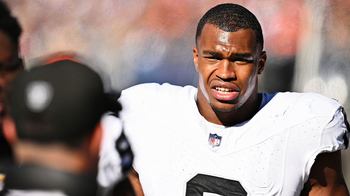 USA; Las Vegas Raiders defensive end Tyree Wilson (9) takes a breather on the sidelines against the Chicago Bears at Soldier Field.