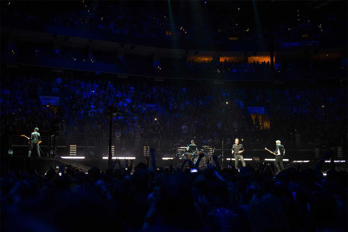  U2 members in the screen on the Experience + Innocence Tour on June 13, 2018.