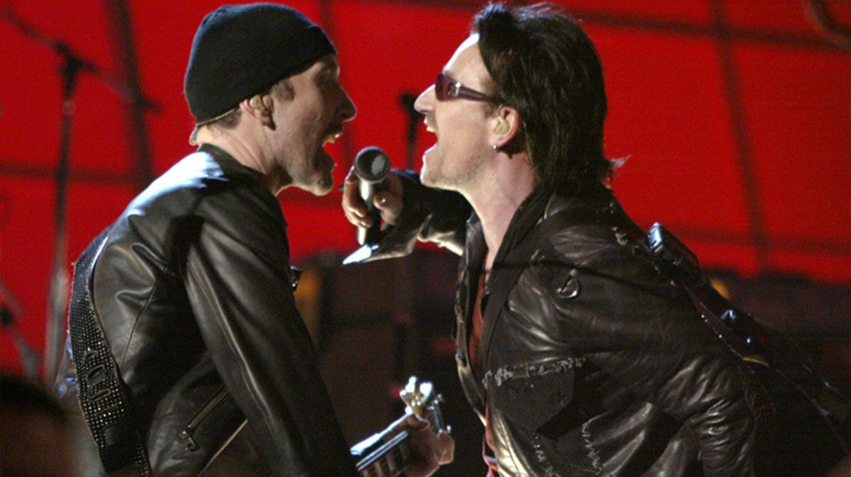U2's The Edge, Bono performing in 2002 at the Grammys.