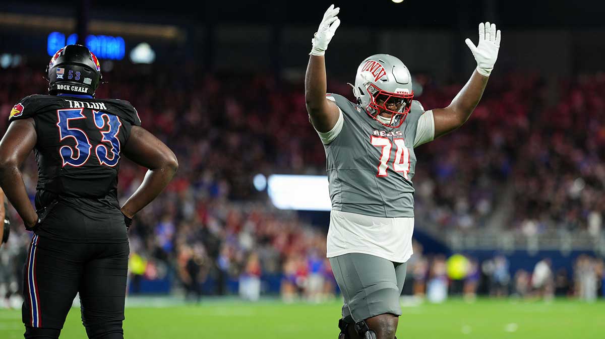 UNLV Rebels offensive lineman Jalen St. John (74) celebrates after the go-ahead touchdown late in the second half against the Kansas Jayhawks at Children's Mercy Park.