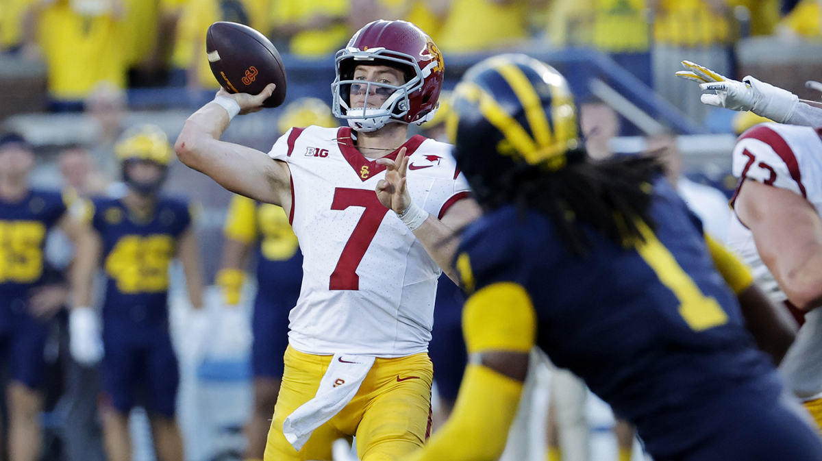 Sep 21, 2024; Ann Arbor, Michigan, USA; USC Trojans quarterback Miller Moss (7) passes in the second half against the Michigan Wolverines at Michigan Stadium.