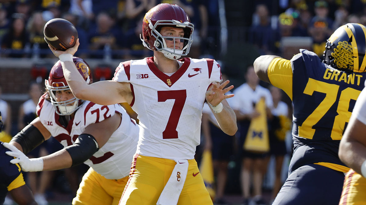 USC Trojans quarterback Miller Moss (7) passes in the first half against the Michigan Wolverines at Michigan Stadium.