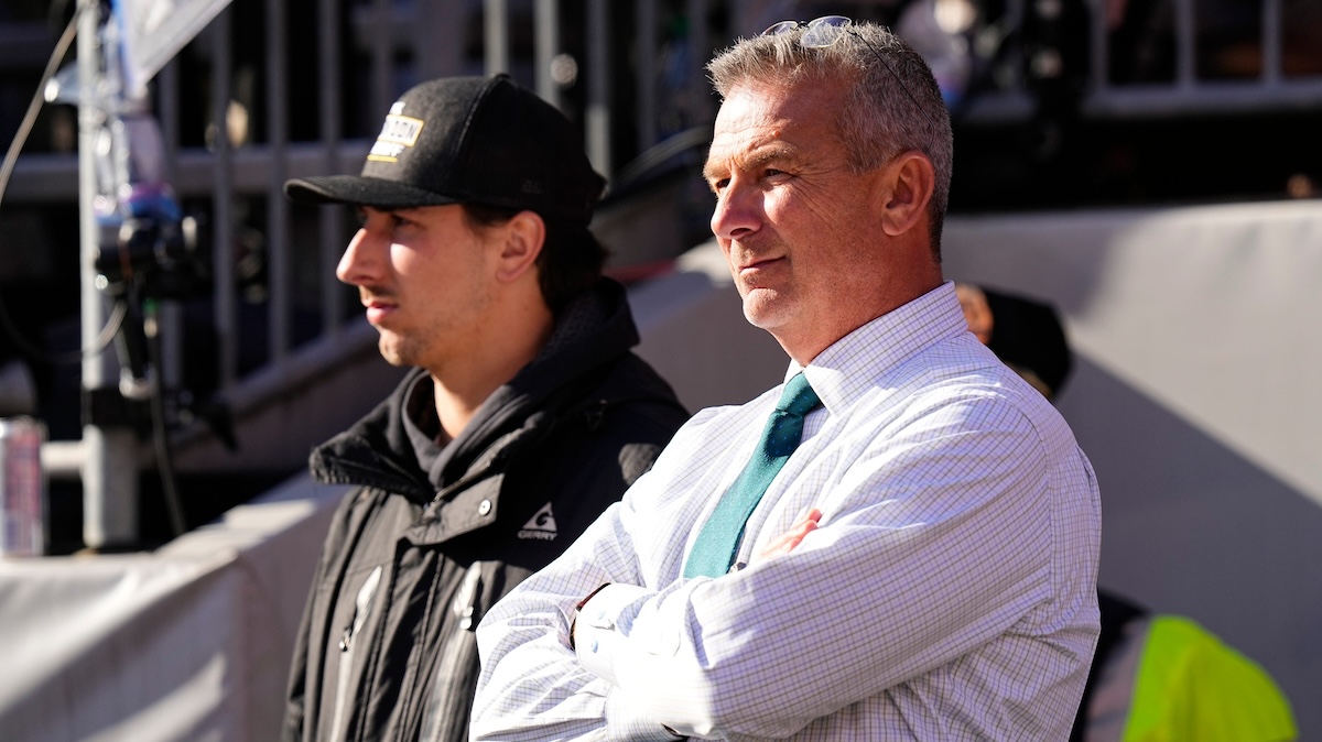 Former Ohio State Buckeyes head coach Urban Meyer watches from the sideline during the first half of the NCAA football game between the Buckeyes and the Michigan Wolverines at Ohio Stadium.