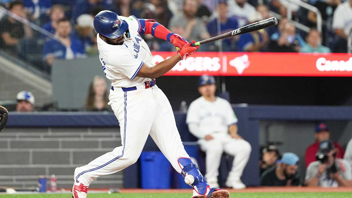 Toronto Blue Jays first base Vladimir Guerrero Jr. (27) takes a ball off the ankle against the Miami Marlins during the fifth inning at Rogers Centre.