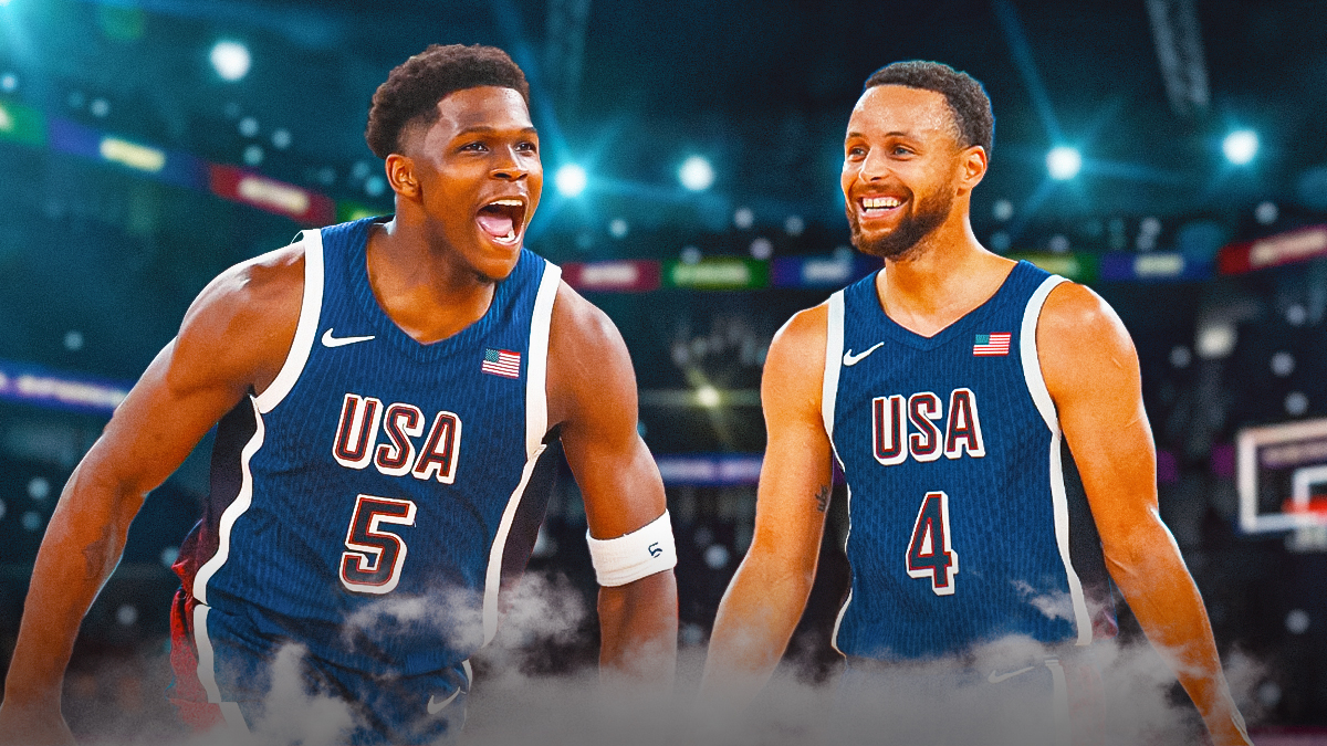 Anthony Edwards and Stephen Curry beside each other wearing Team USA gear.