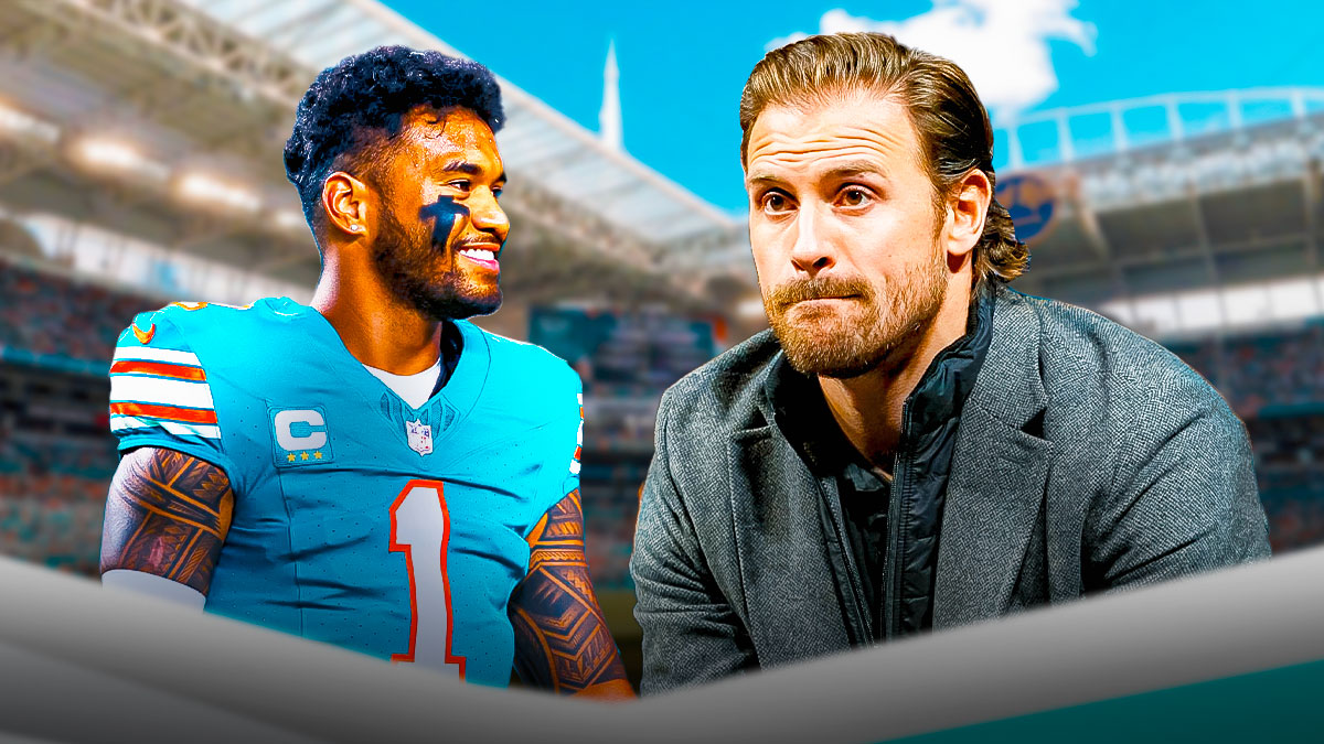 Chris Long and Tua Tagovailoa in front of Hard Rock Stadium